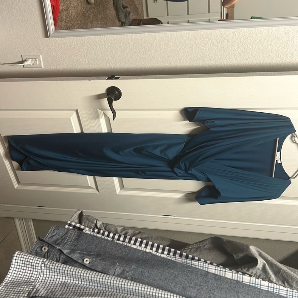 Teal color. Brand is Dress Day. Looks new!